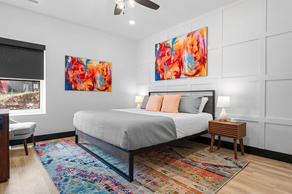 Is THIS one your favorite?  King bed, white noise machine, beautiful colors, and this room even has a desk for you to work at if you need to while you're away.