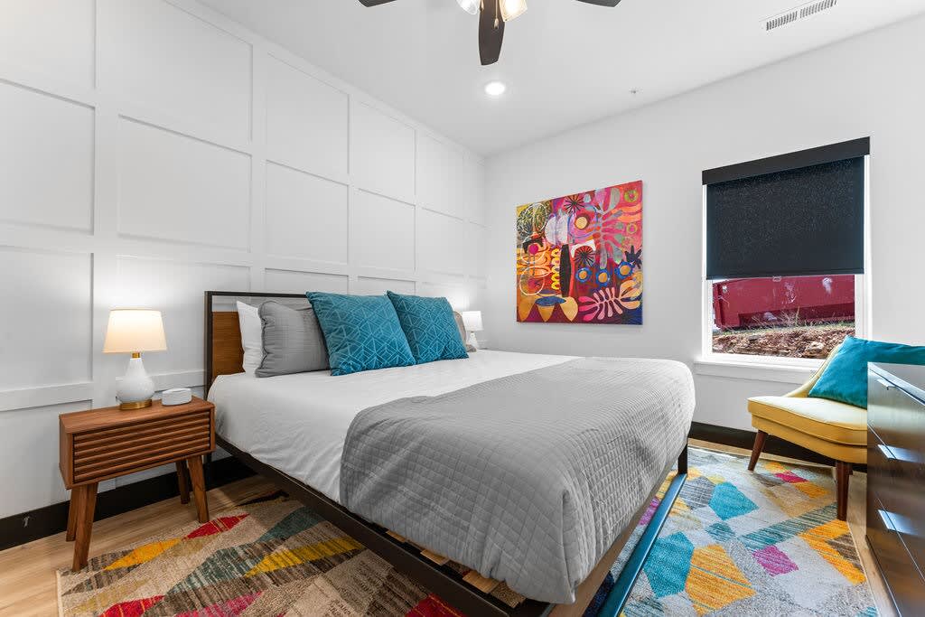 ...or is THIS your favorite room?  Another king bed, white noise machine, and more beautiful colors, with an attached full bathroom.