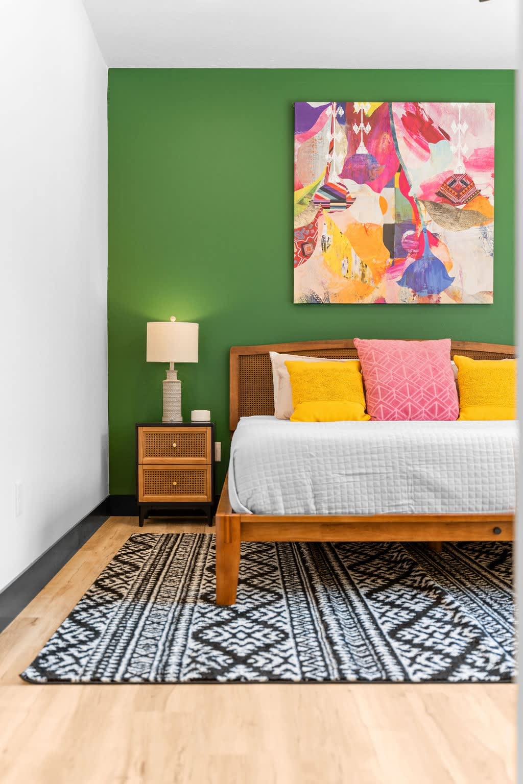 Note the white noise machine on the bedside stand for your sleeping pleasure, along with all those gorgeous colors!