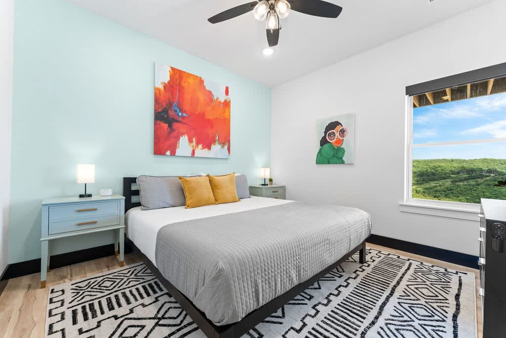 Now we're down on the 3rd (bottom) level!  Another king bedroom with white noise machine, attached bathroom, and an eclectic teal theme.