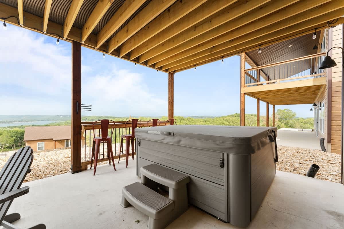 8-person hot tub, with a view and a drink rail so people can hang out around the hot tub as well