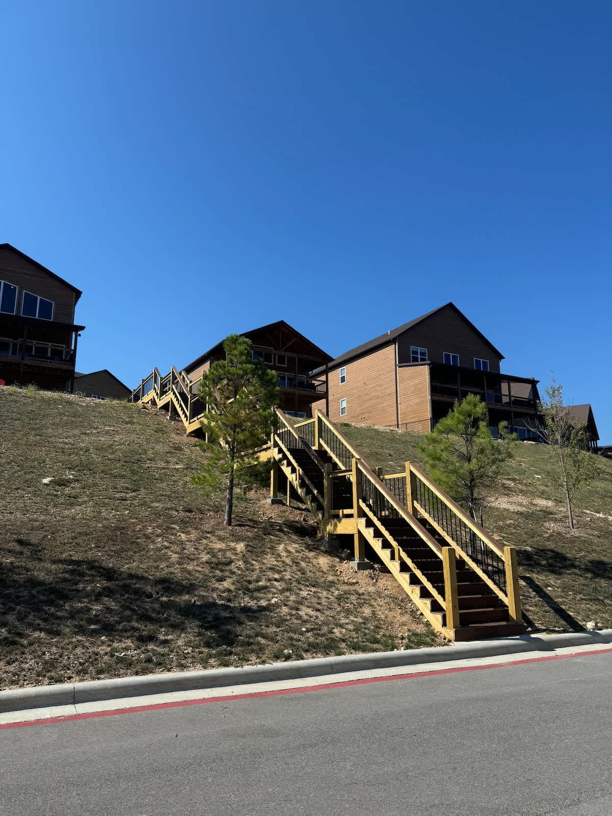 NEW!  Stair directly across from the front door that leads straight to the upper level pool area! 