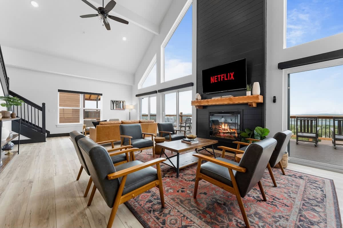 Beautiful living room is available for lounging, with lots of seating and gathering areas.