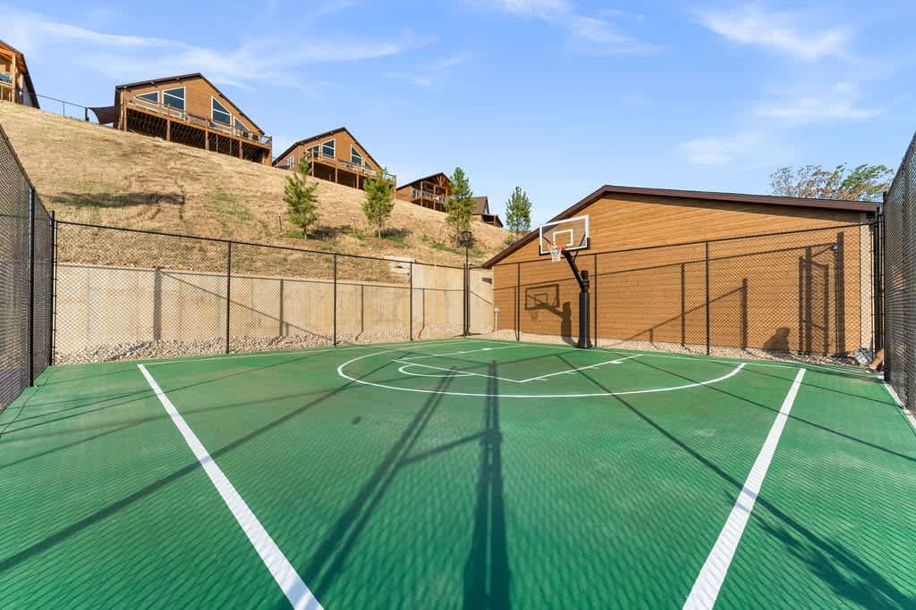 A basketball court is available for guests to use, right by the entry to Wilderness Mountain! 