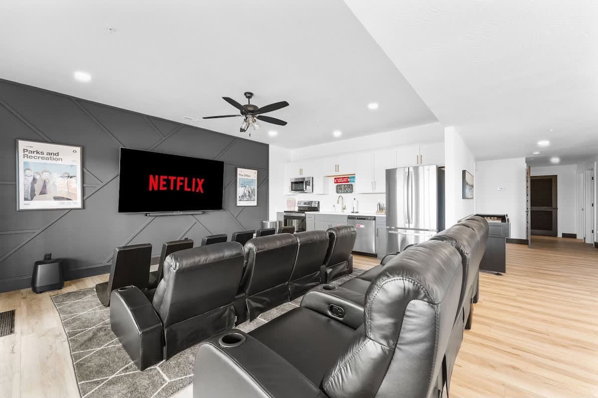 Theater Room like no other!  Comfortably seats 14, with the back row as recliners.  We also invested in a VERY NICE sound bar for your movie enjoyment in the evenings