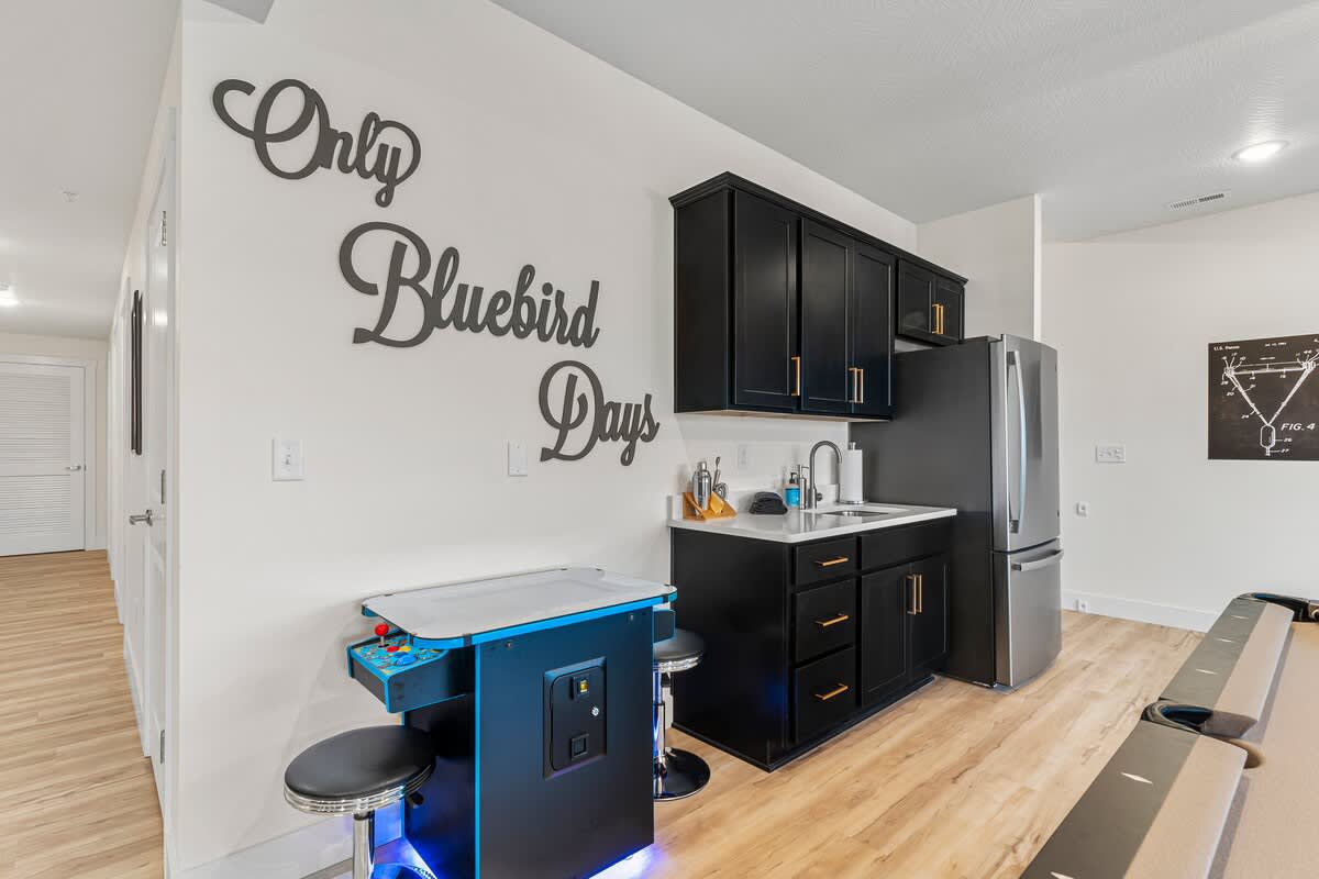 Downstairs Kitchenette in the Game Room with an Arcade Game with 2000 Games