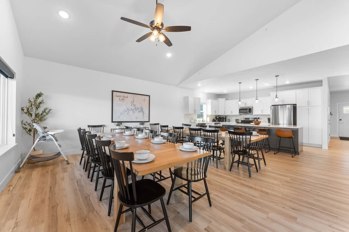 Seating for all with two solid wood tables and a baby high chair