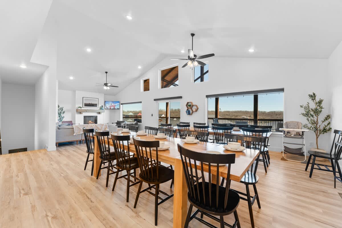 Seating for all with two solid wood tables and a baby high chair