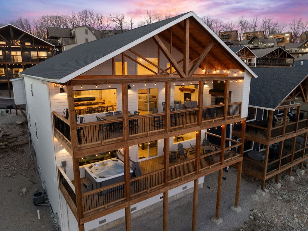 Two Back Decks with amazing views, plenty of seating, Outdoor TV, and a Private Hot Tub