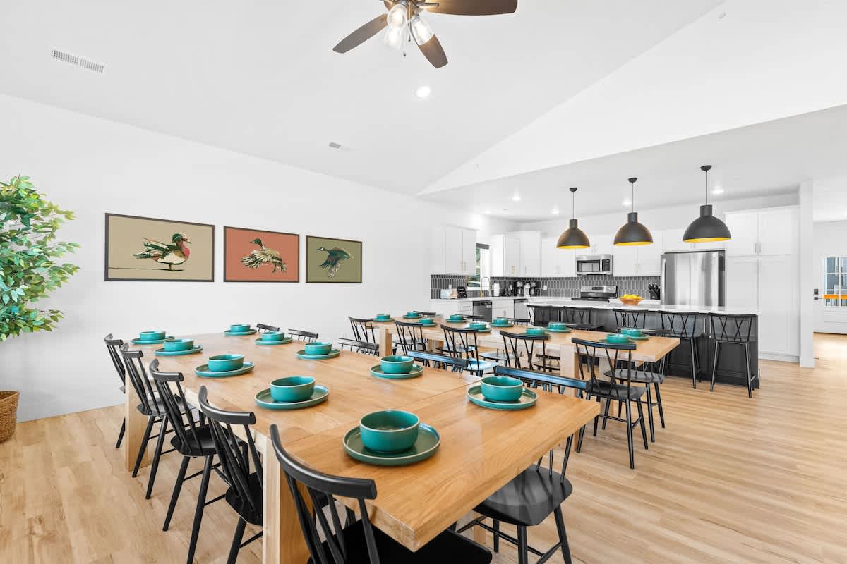 Solid oak dining tables with plenty of seating for a large group
