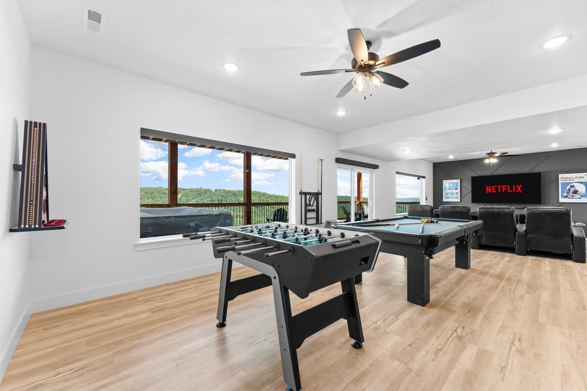 Throw bean bags with Boss Toss, Play Foosball and Pool, and stream TV and Movies on the big screen with reclining theater chairs
