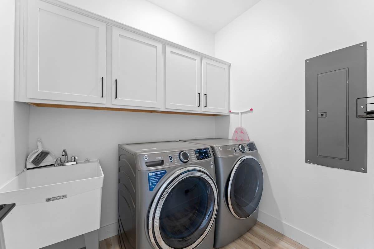 Upstairs Laundry Room. There is also a laundry room on the middle level with full size washer & dryer