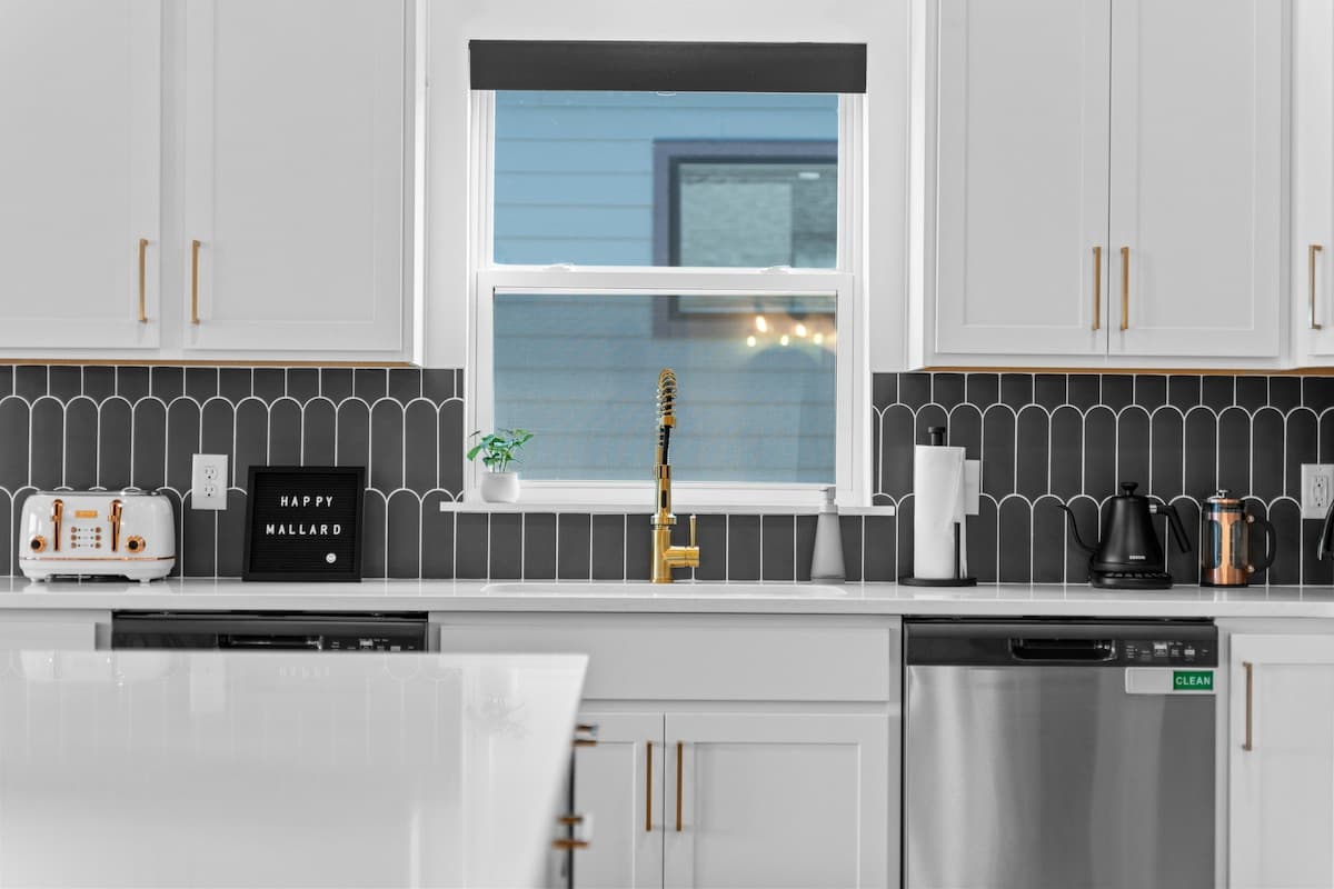 Kitchen with two dishwashers