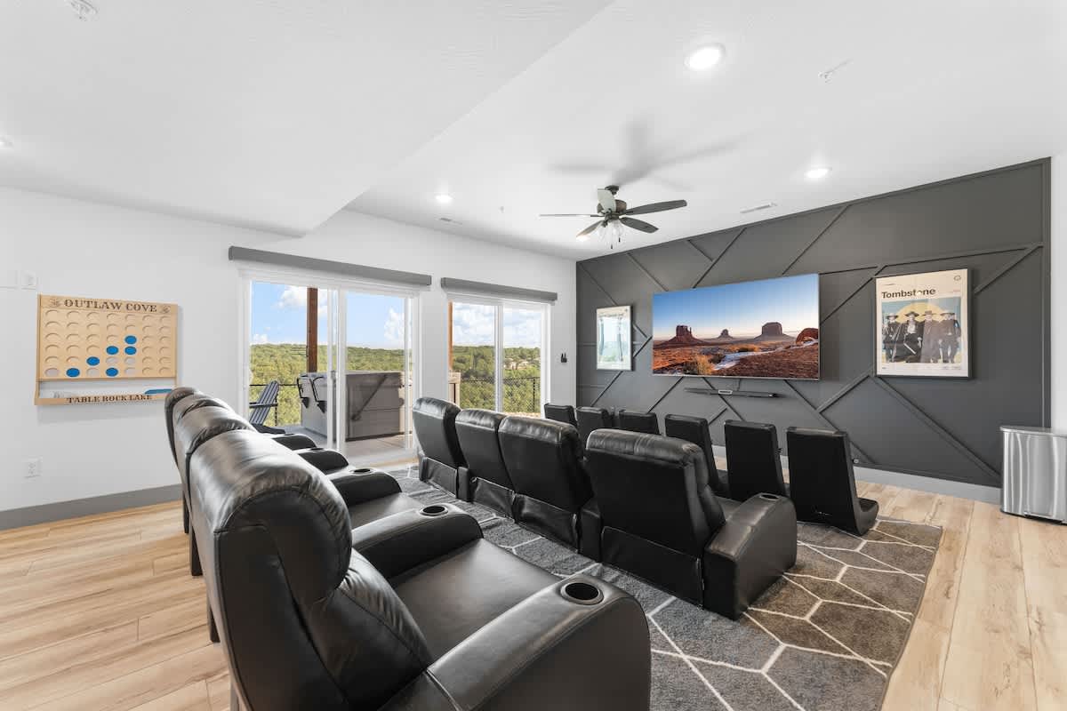 Theater Room with reclining theater seating and a 85" Smart TV