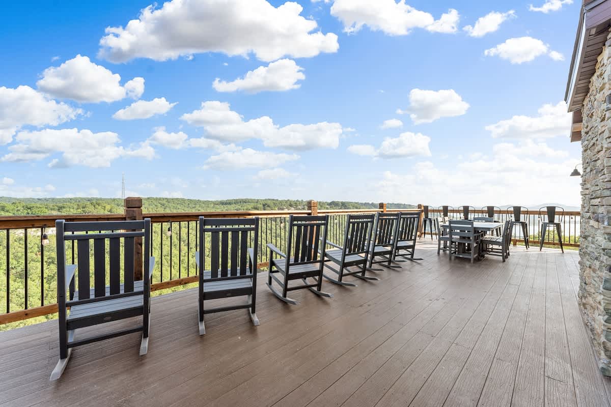 Rocking Chairs and a large dining table on the back deck to enjoy the great views