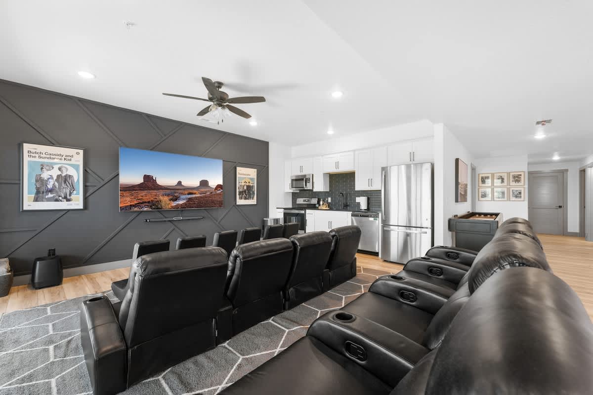 Theater Room with reclining theater seating and a 85" Smart TV