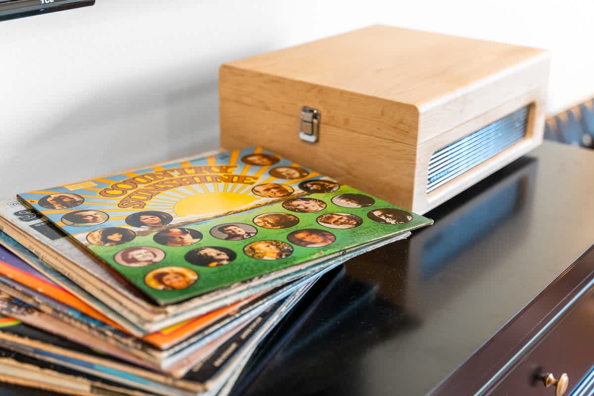 Record Player with with plenty of vinyls in the Primary Bedroom