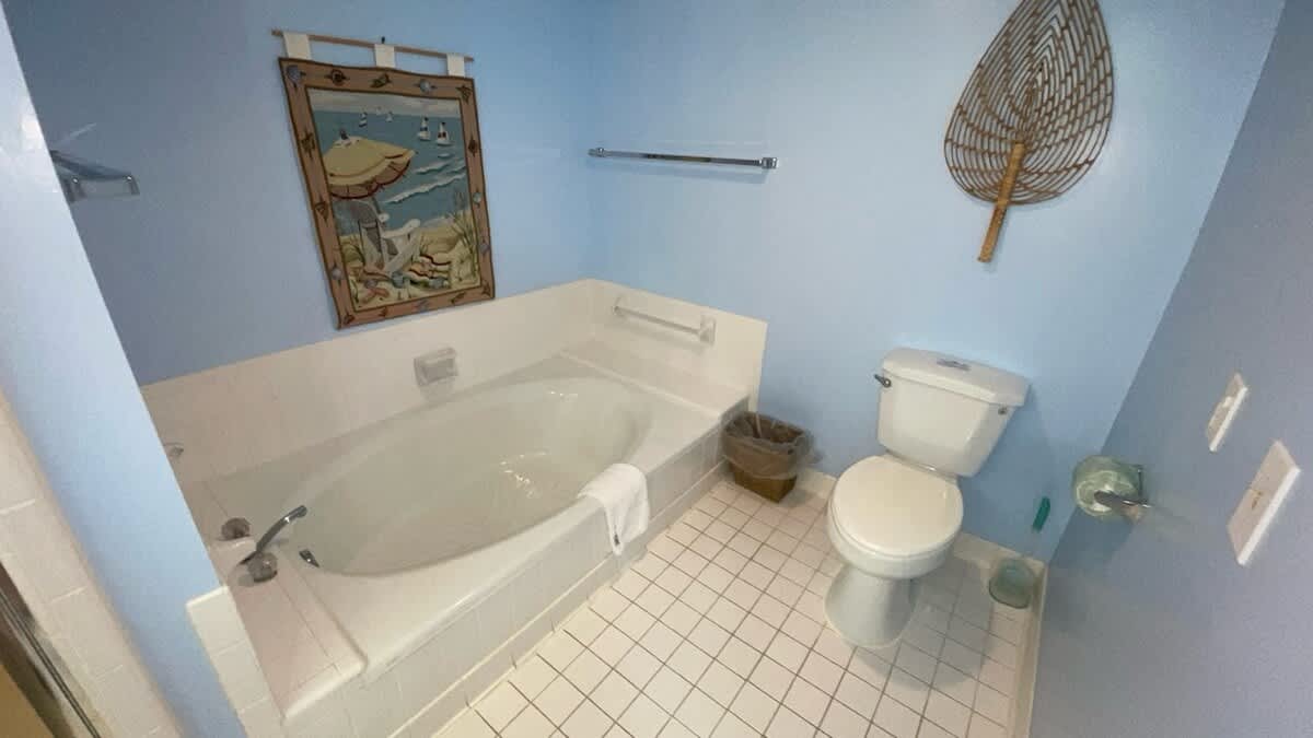 First floor primary bedroom with en suite bathroom