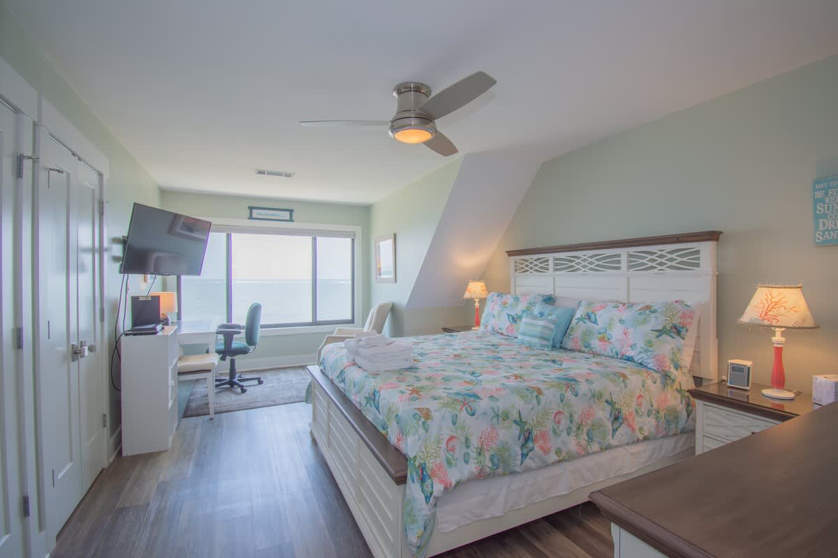 2nd Level Primary Bedroom with King Bed, Full En Suite Bathroom and Ocean View