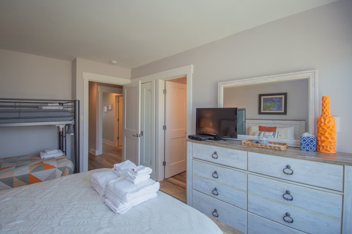 2nd Level Guest Bedroom with Twin over Twin Bunkbed and Queen Bed