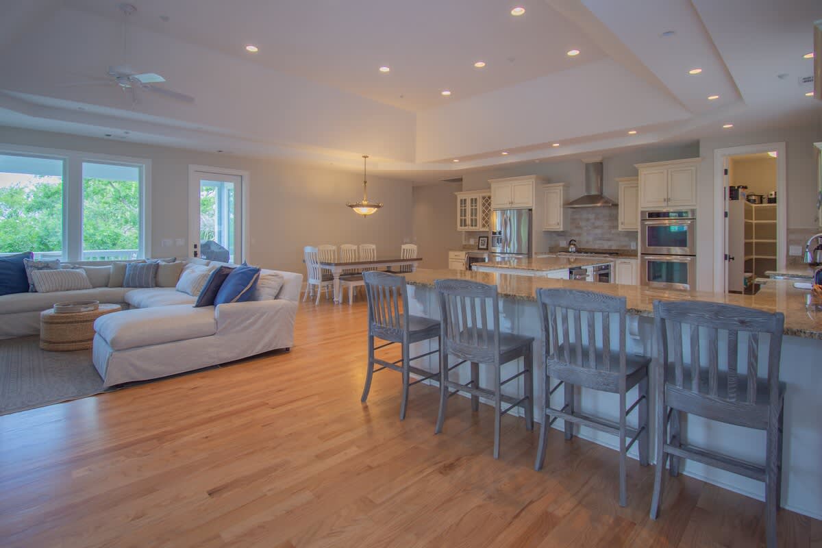 Massive open concept kitchen, dining and living room area