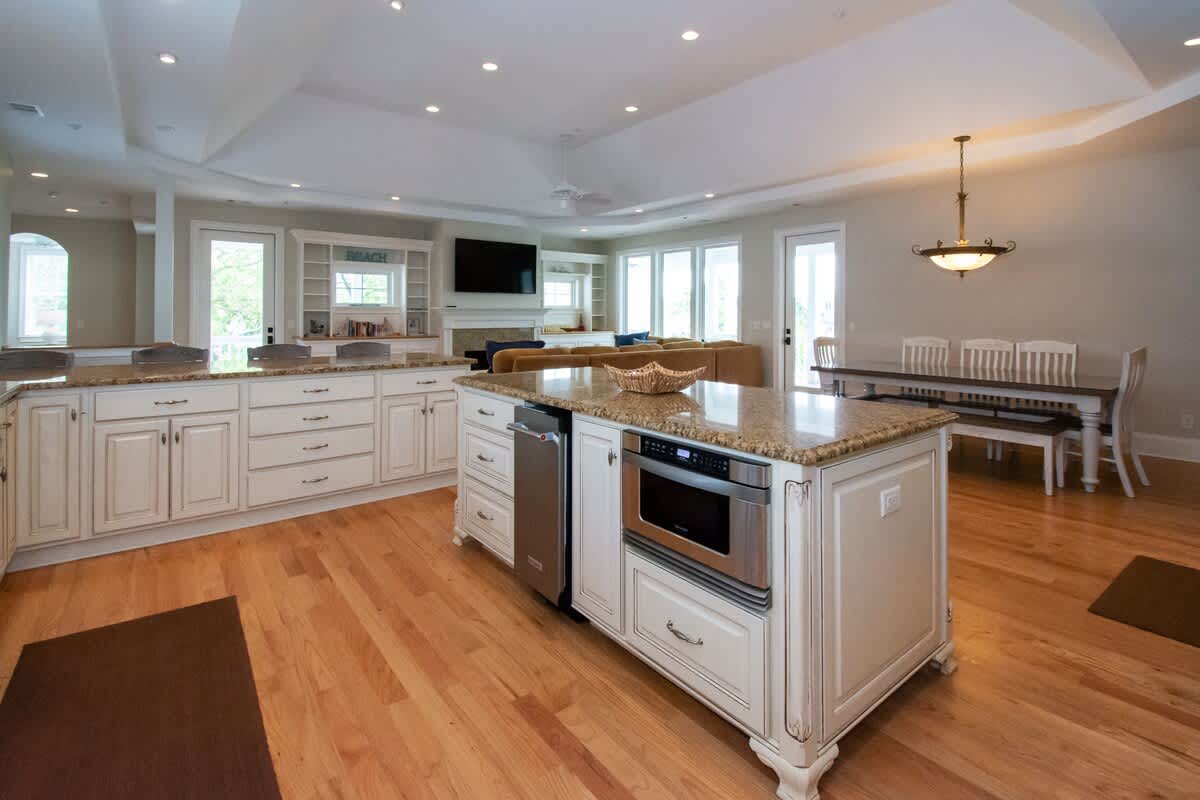 Massive open concept kitchen, dining and living room area