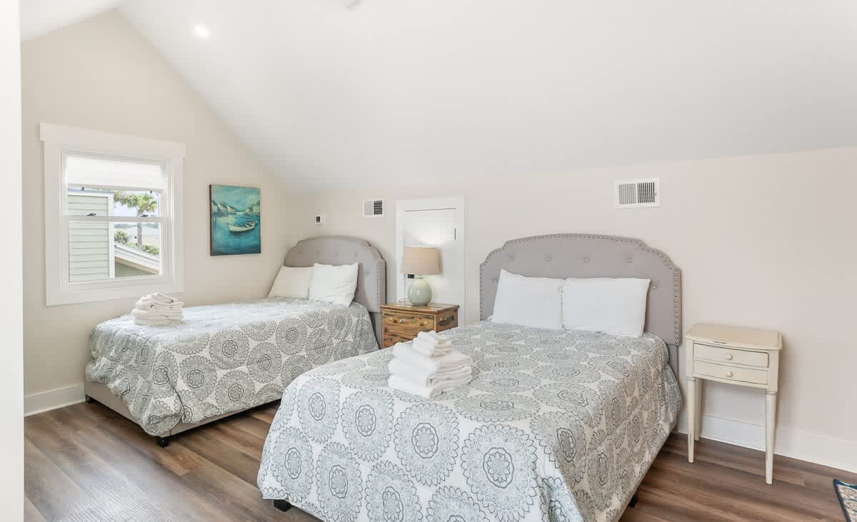 Two Full Beds + One Twin, with En-Suite Bath (walk in shower)