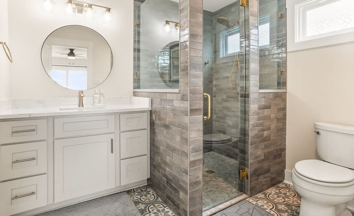 Primary Suite with En-Suite Bath Featuring a Walk-In Shower