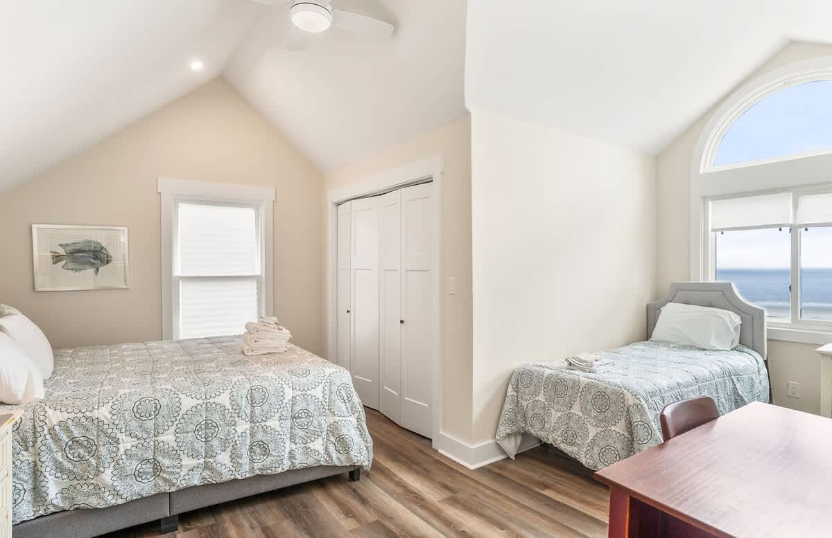 Bedroom 2: One King + One Twin, with En-Suite Bath Featuring a Walk-In Shower