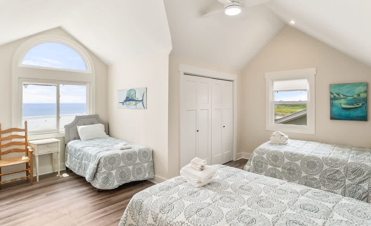 Two Full Beds + One Twin, with En-Suite Bath (walk in shower)