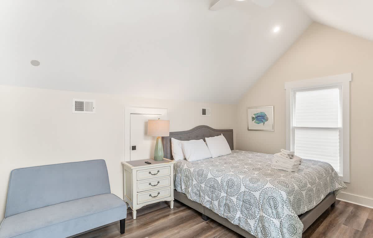 Bedroom 2: One King + One Twin, with En-Suite Bath Featuring a Walk-In Shower