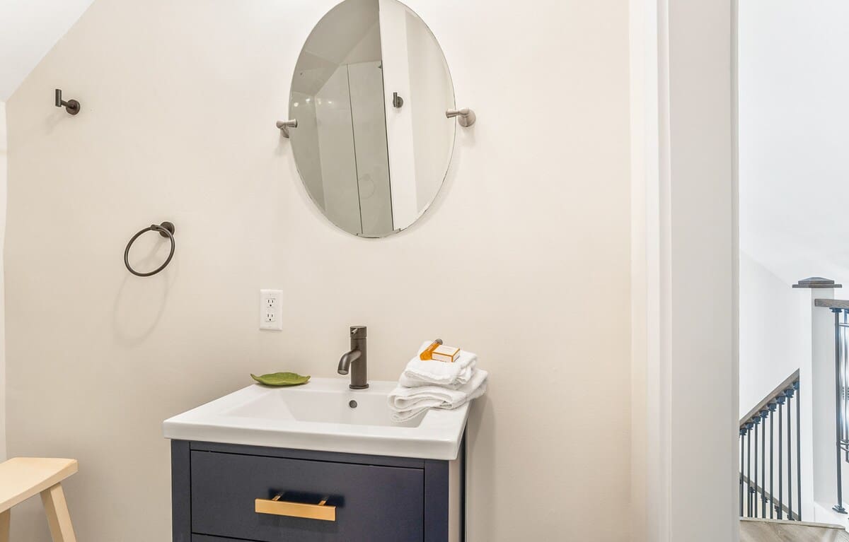 Bedroom 2: One King + One Twin, with En-Suite Bath Featuring a Walk-In Shower