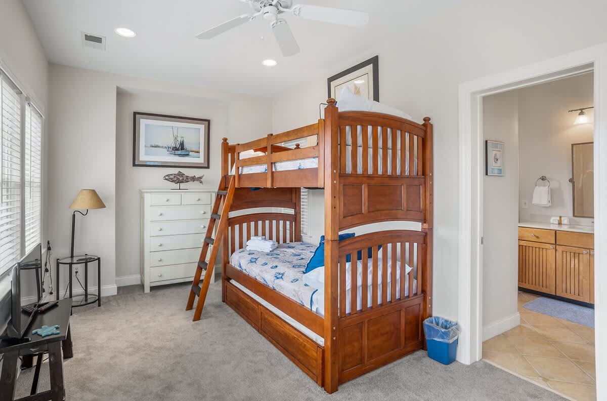 Bunk Bed (1 Trundle) with Streaming TV, Private Balcony, and a Shared Jack-and-Jill Bathroom with a Shower-Tub Combo. 