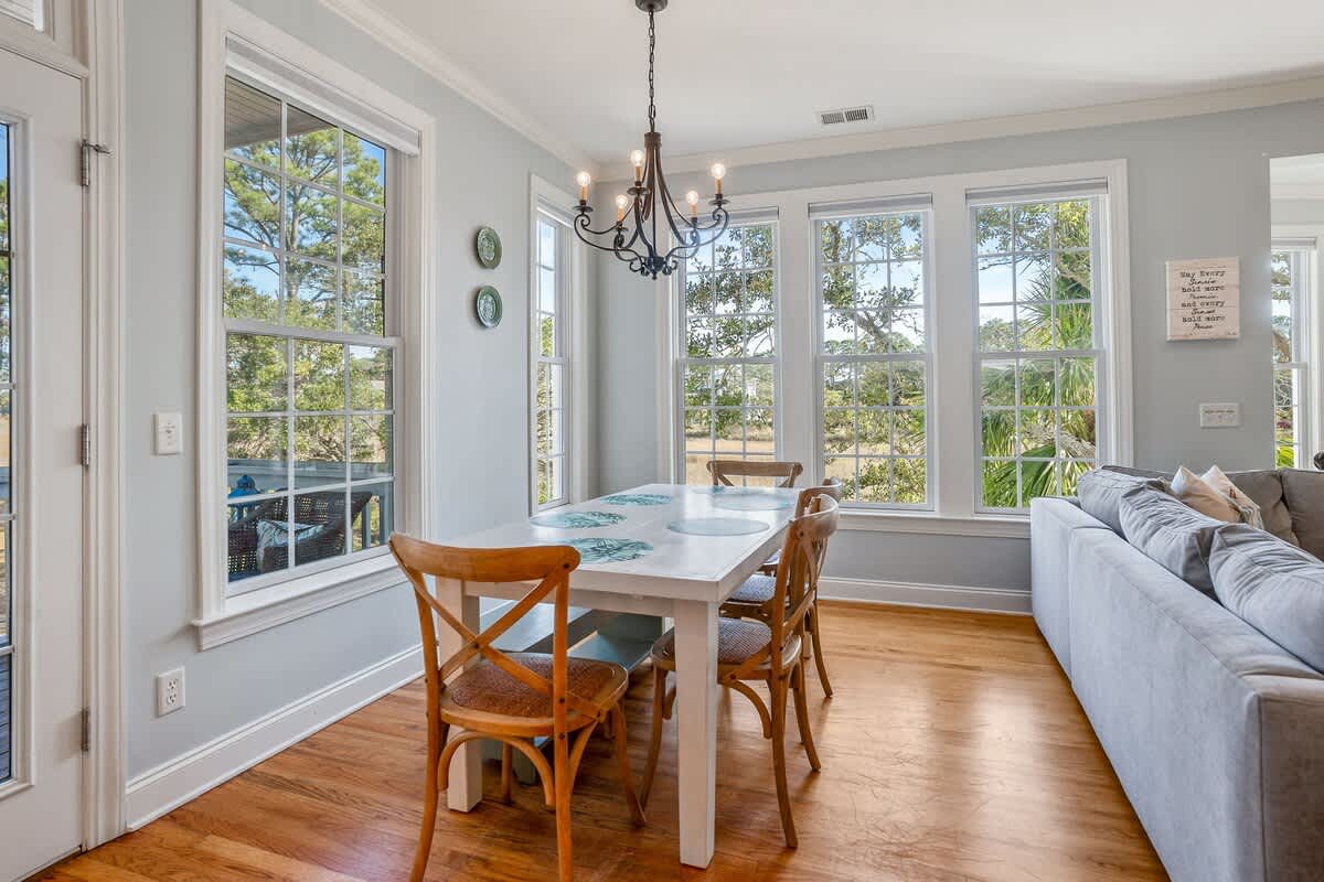 Open Layout Connecting the Kitchen, Dining Area, and Main Living Room