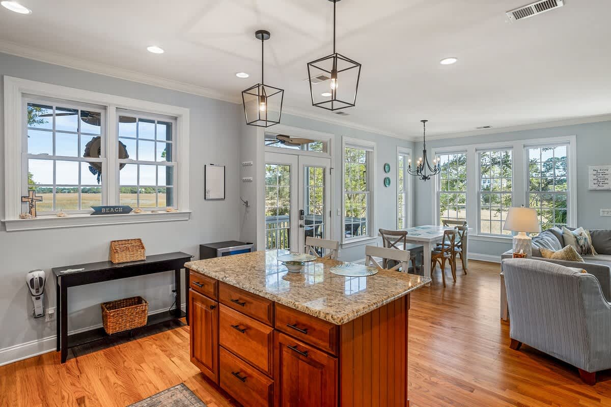 Updated Kitchen Comes with Stainless Steel Appliances—Including a Wine Cooler—and a Two-Seat Island