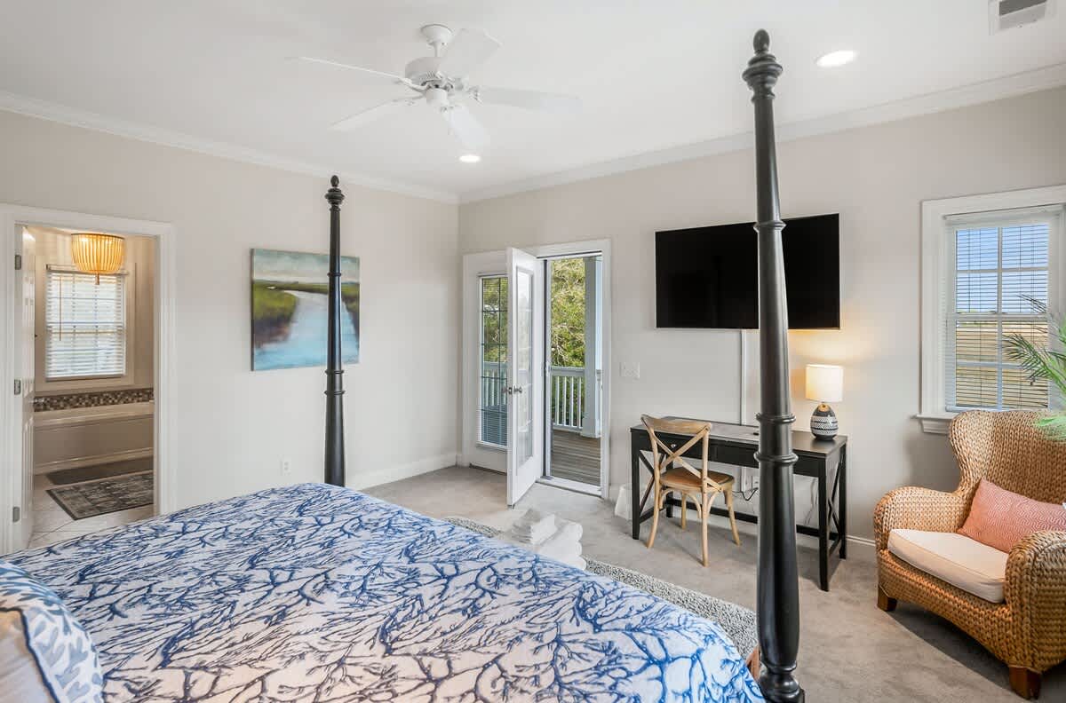 Upstairs Primary Suite has a King-Sized Bed, Streaming TV, Walk-In Closet, Private Balcony with a Large Ensuite Bathroom 