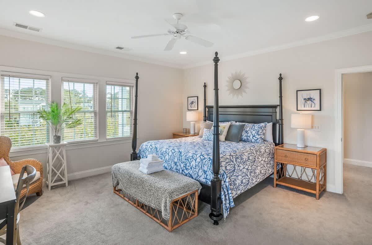 Upstairs Primary Suite has a King-Sized Bed, Streaming TV, Walk-In Closet, Private Balcony with a Large Ensuite Bathroom 