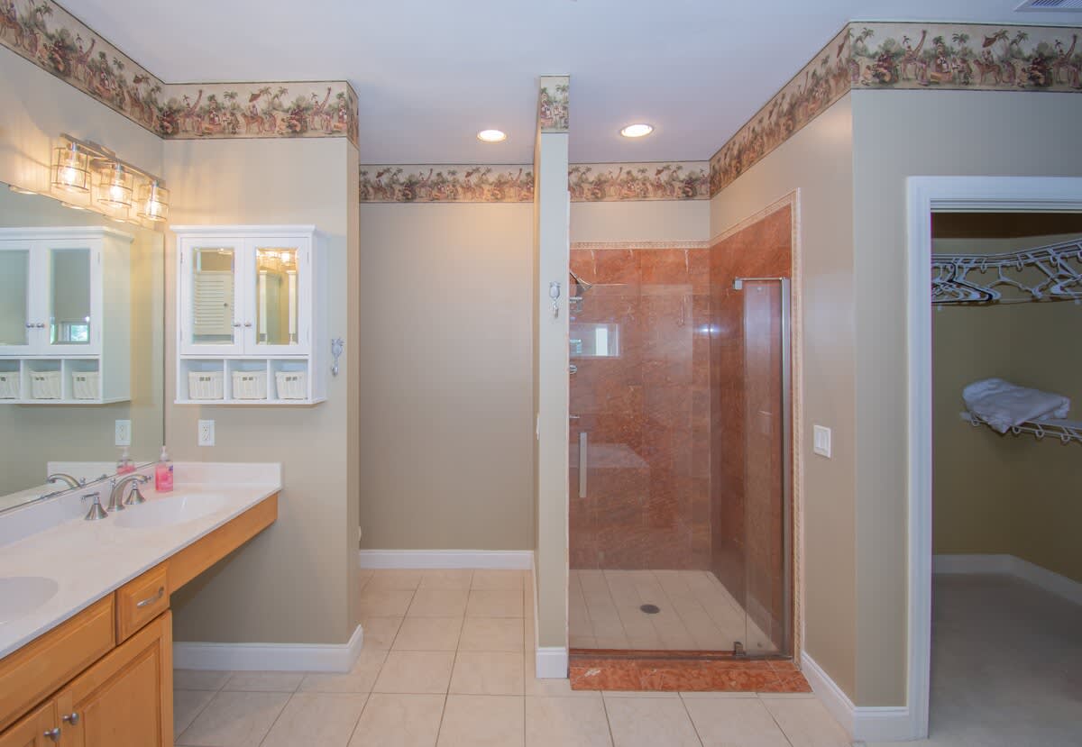 Primary En-Suite with Double Vanity, Soaker Tub, Walk in Shower 