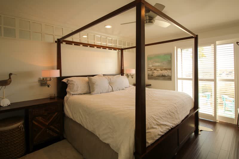 Primary Bedroom with King Bed and Access to Patio
