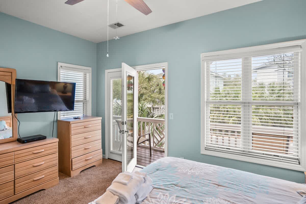 First Floor Bedroom with King Size Bed & Balcony. Access to Full Bathroom from Bedroom and Foyer. 
