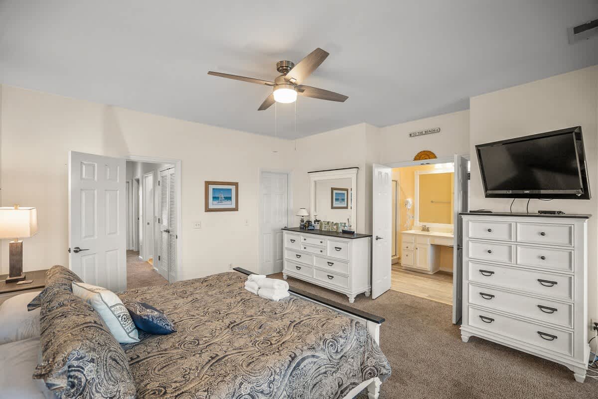 Primary Bedroom: King Bed with Access to Deck and Full Bath Ensuite.