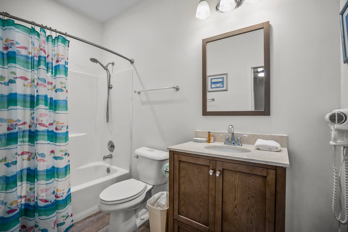 Full Bathroom with Access to First Floor Guest Bedroom and Foyer.