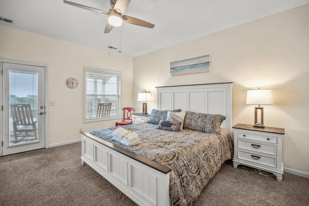Primary Bedroom: King Bed with Access to Deck and Full Bath Ensuite.