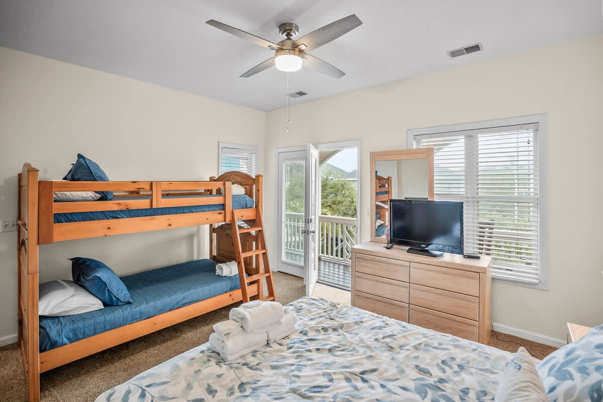 Guest Bedroom: Queen Bed with Twin Bunk Bed. Access to Deck and Full Bath Ensuite. 