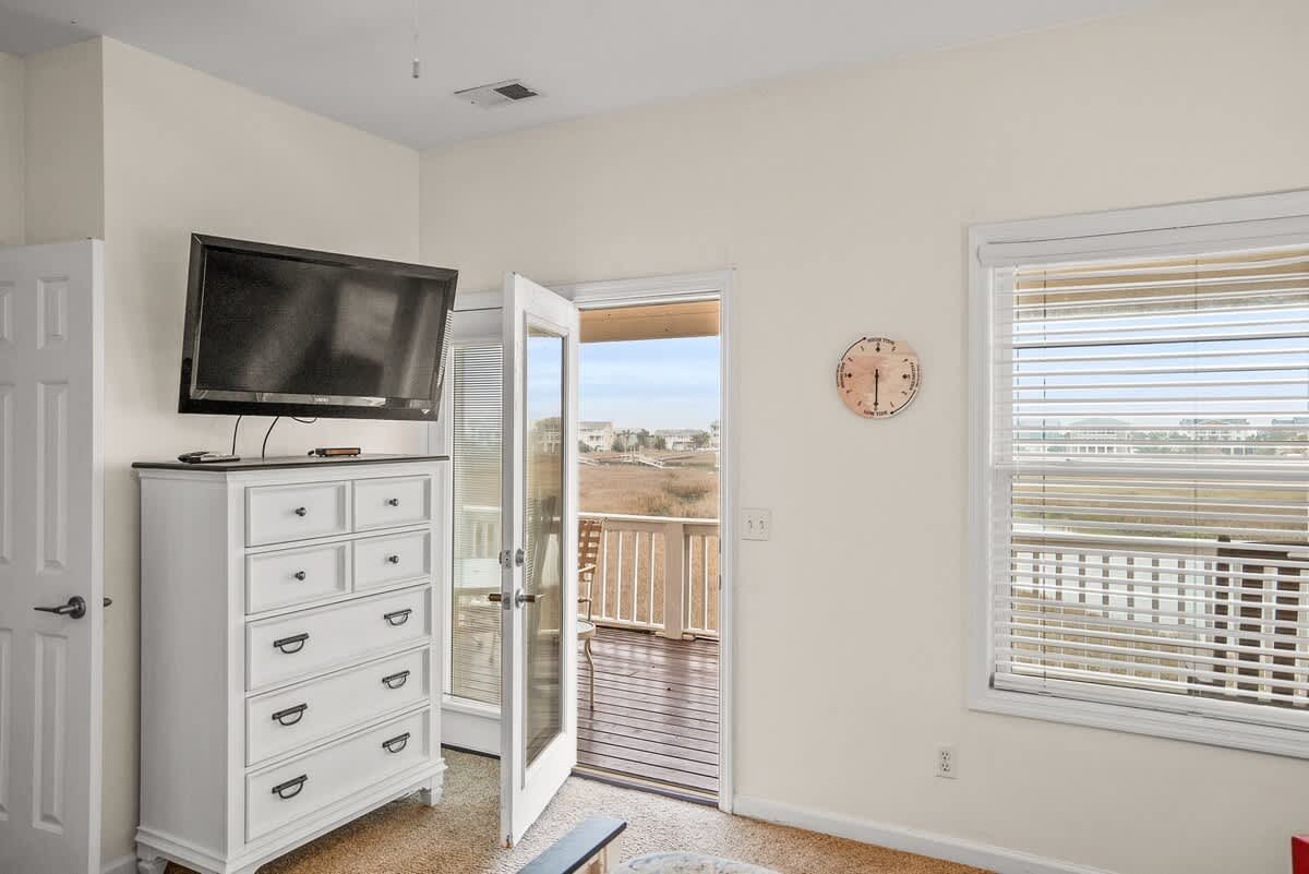 Primary Bedroom: King Bed with Access to Deck and Full Bath Ensuite.