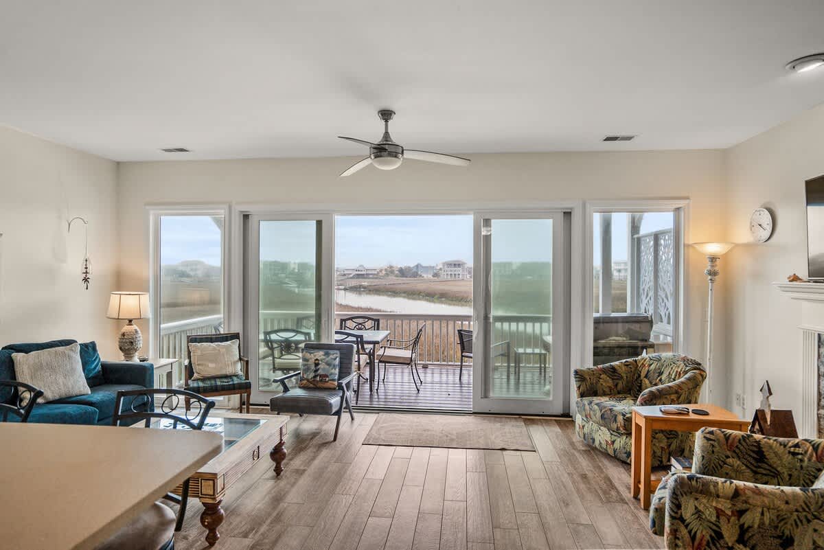 Living Room With Sliding Glass Door to Back Deck 