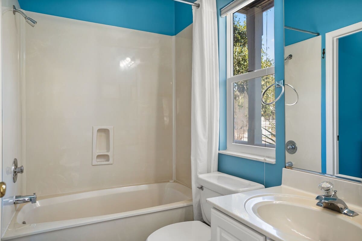 Guest En Suite Bathroom with Access to Laundry Area