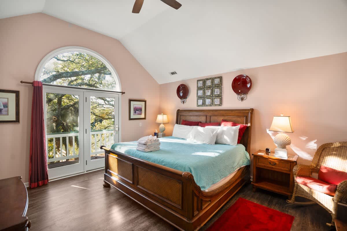 Upstairs Guest Bedroom With King Bed and Private Balcony 
