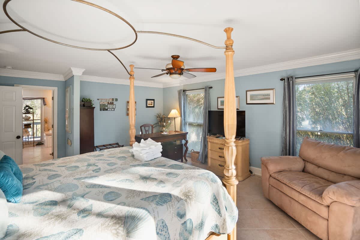 Primary Bedroom with a En-Suite Bathroom, and Balcony. This Bedroom also Includes a Brand-New Smart TV.