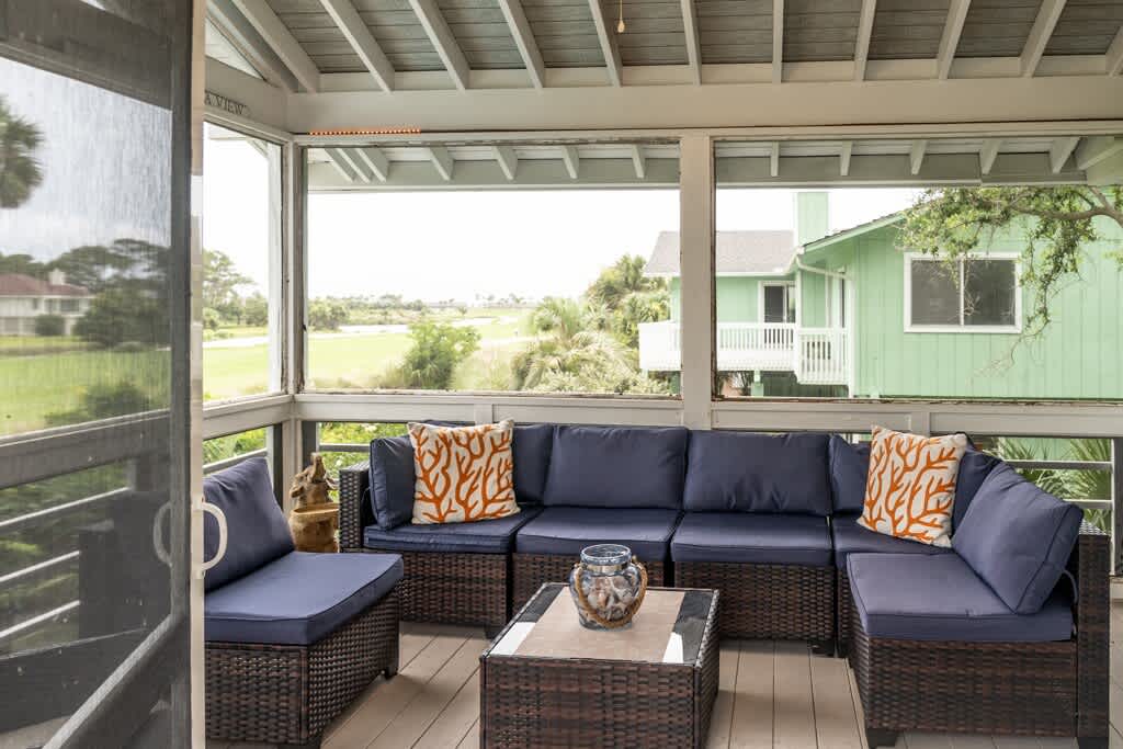 Screened Porch with Access to Living Room and Staircase to Pool